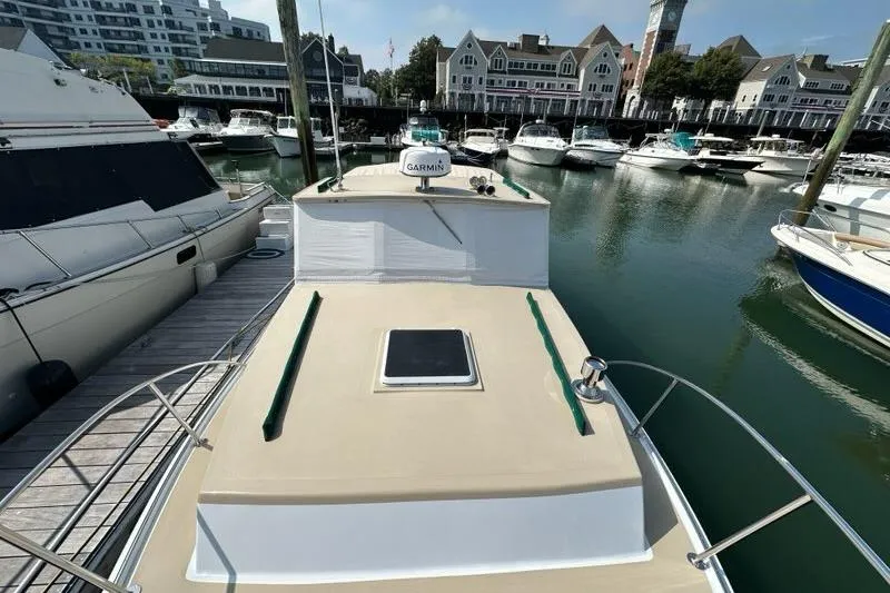 Slide: The Image of 1987 Holland 32 boat deck with hatch, docked at marina. - 24