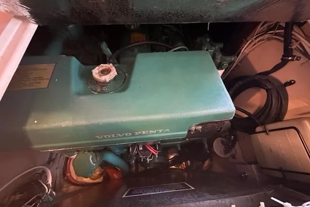 Slide: The Image of Wooden step ladder with metal frame, featuring non-slip mats, Holland 32, 1987 model. - 55