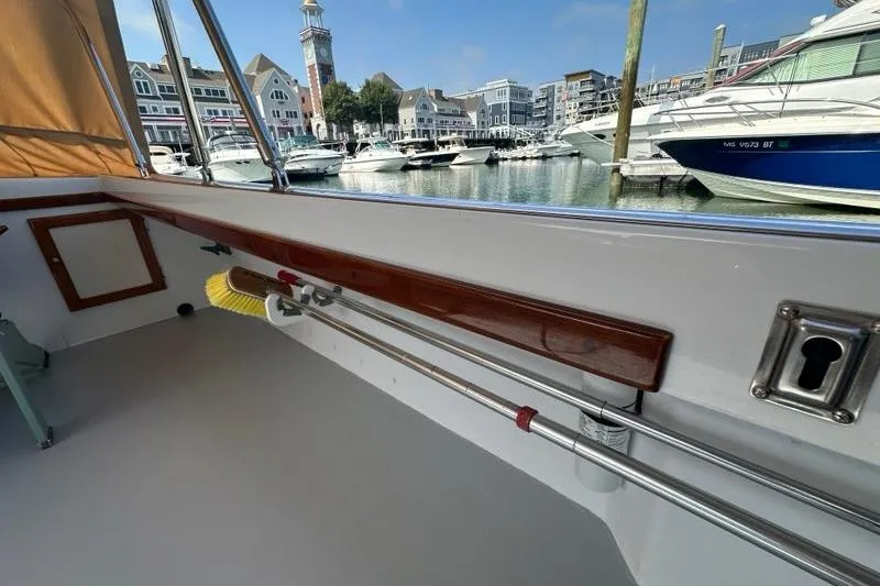 Slide: The Image of Fire extinguisher and speaker on 1987 Holland 32 boat interior. - 59