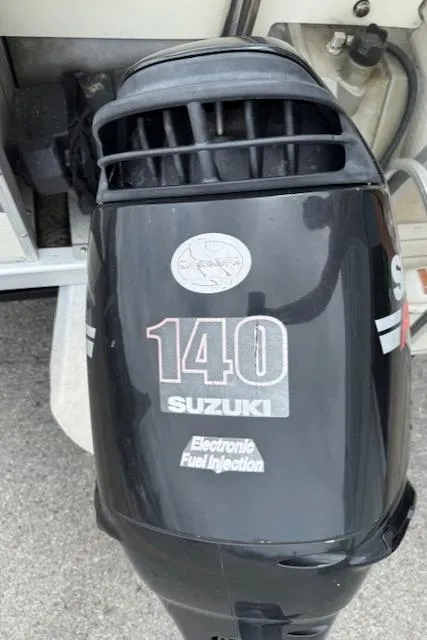 Slide: The Image of Suzuki 140 outboard motor with electronic fuel injection on a 2008 Bennington 2277FSi boat. - 23