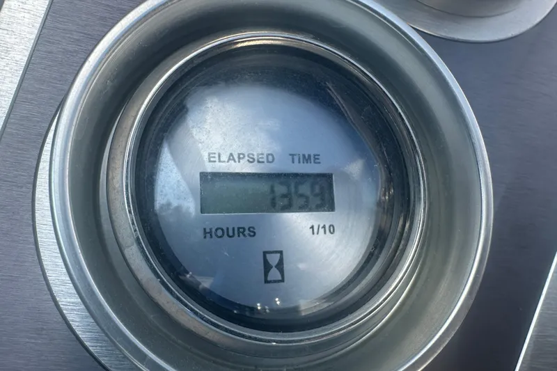 Slide: The Image of Elapsed time gauge showing 135.9 hours on a 2020 Crest Caribbean RS 250 SLS. - 11