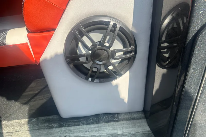 Slide: The Image of Speaker on 2020 Crest Caribbean RS 250 SLS boat with red and white seating. - 15