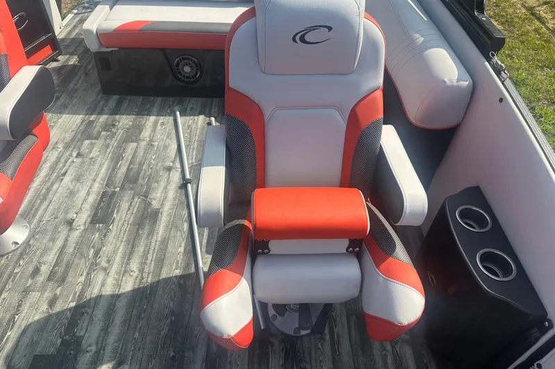 Slide: The Image of Red and gray seating on 2020 Crest Caribbean RS 250 SLS boat interior. - 19