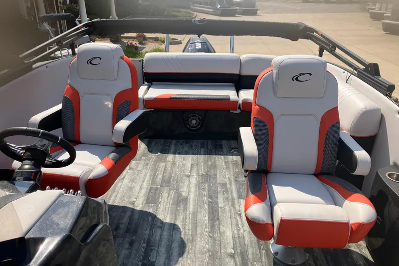 Slide: The Image of 2020 Crest Caribbean RS 250 SLS boat interior with red and white seating. - 5