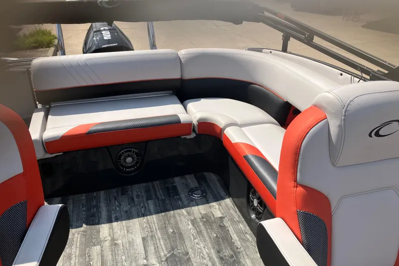 Slide: The Image of 2020 Crest Caribbean RS 250 SLS boat interior with red and white seating. - 6