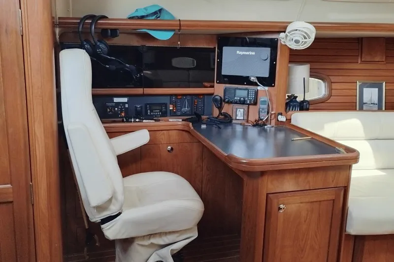 Slide: The Image of Interior of 2009 Hunter 50 Center Cockpit with navigation station and comfortable seating. - 10