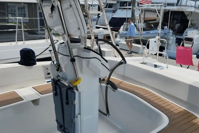 Slide: The Image of 2009 Hunter 50 Center Cockpit sailboat with modern helm and spacious deck. - 4