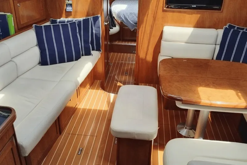 Slide: The Image of Luxurious interior of 2009 Hunter 50 Center Cockpit yacht with elegant seating and table. - 7
