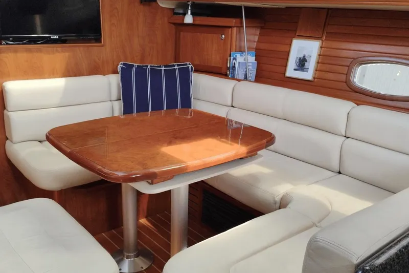 Slide: The Image of Luxurious interior of 2009 Hunter 50 Center Cockpit yacht with elegant seating and table. - 8