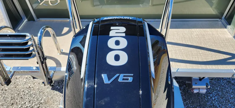 Slide: The Image of 2024 Avalon Platinum LSZ 2385 Elite with Mercury 200 V6 engine, rear view. - 10