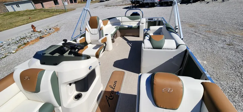 Slide: The Image of 2024 Avalon Platinum LSZ 2385 Elite pontoon boat with luxurious seating and modern design. - 12