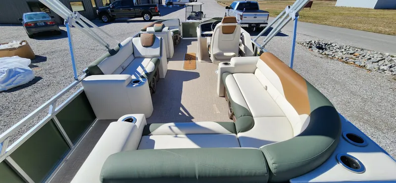 Slide: The Image of 2024 Avalon Platinum LSZ 2385 Elite pontoon boat with spacious seating and modern design. - 14