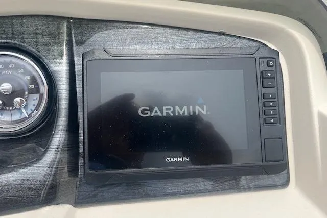 Slide: The Image of Garmin display on 2024 Avalon Platinum LSZ 2385 Elite dashboard with speedometer. - 17