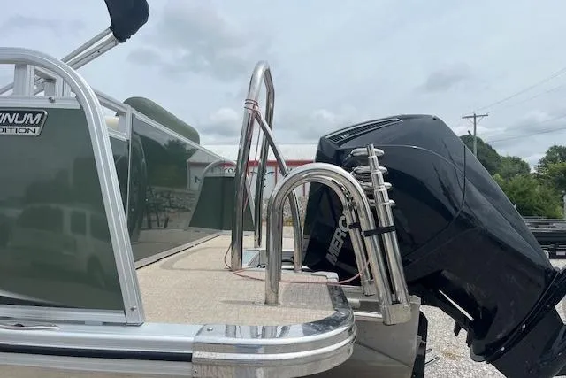 Slide: The Image of 2024 Avalon Platinum LSZ 2385 Elite pontoon boat with Mercury outboard motor. - 20