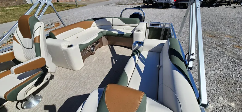 Slide: The Image of 2024 Avalon Platinum LSZ 2385 Elite pontoon boat interior with stylish seating and modern design. - 4