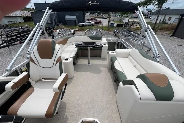 Slide: The Image of 2024 Avalon Platinum LSZ 2385 Elite pontoon boat with luxurious seating and modern design. - 9