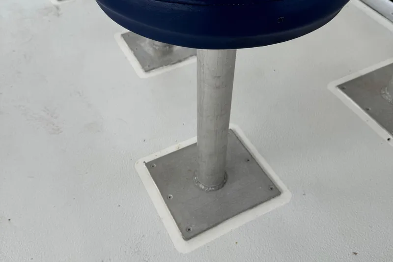 Slide: The Image of Close-up of a 2022 Guthrie Boatworks A&M Custom Pontoon seat base on deck. - 37