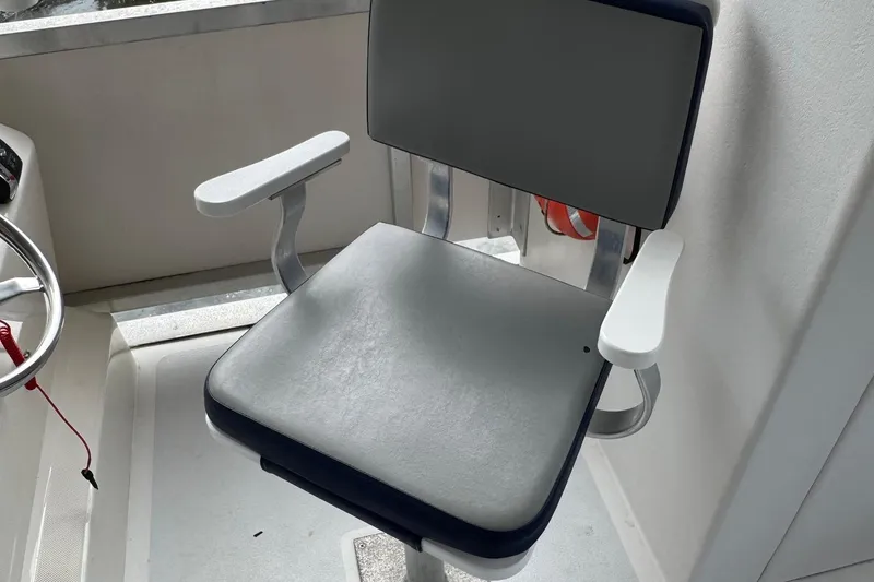 Slide: The Image of Captain's chair on 2022 Guthrie Boatworks A&M Custom Pontoon. - 42
