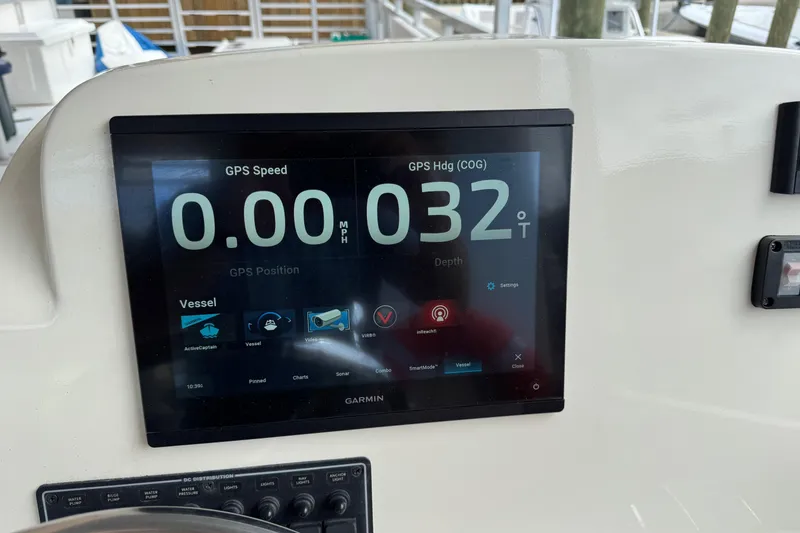 Slide: The Image of Garmin GPS display on 2022 Guthrie Boatworks A&M Custom Pontoon dashboard. - 48