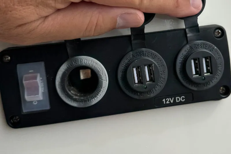 Slide: The Image of 2022 Guthrie Boatworks A&M Custom Pontoon 12V DC power panel with USB ports. - 52