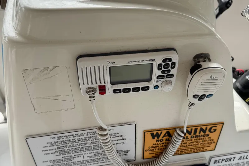 Slide: The Image of Control panel of 2022 Guthrie Boatworks A&M Custom Pontoon with Icom VHF marine radio. - 53