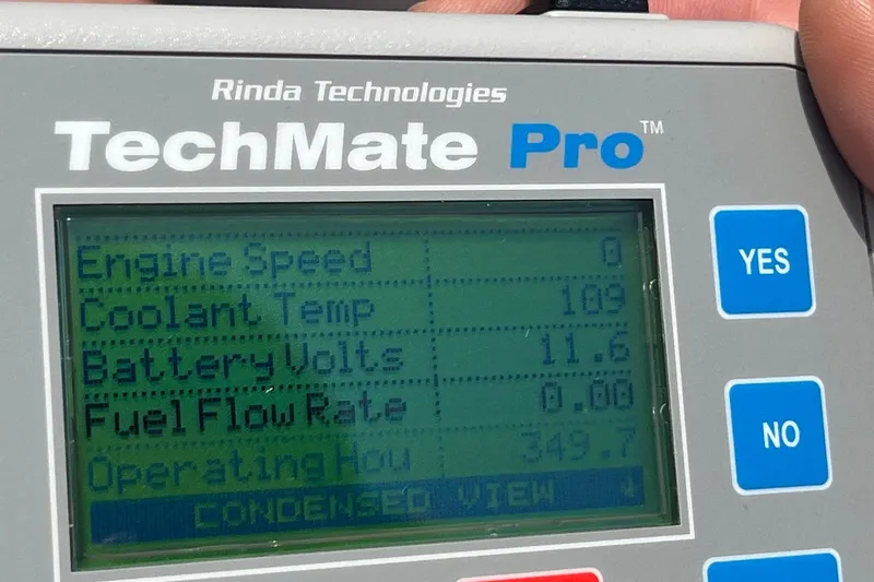 Slide: The Image of TechMate Pro displaying engine diagnostics for 1999 Donzi 22 Classic boat. - 18