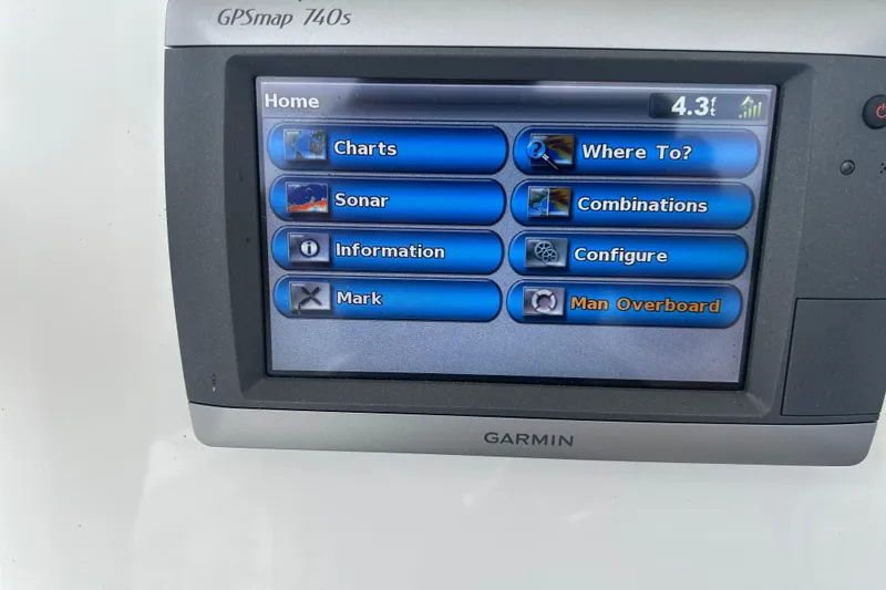 Slide: The Image of Garmin GPSmap 740s display on 2014 Sea Hunt Gamefish 27 boat, showing navigation options. - 21