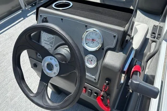Slide: The Image of Steering console of 2026 Sun Tracker Bass Buggy 18 DLX pontoon boat. - 21