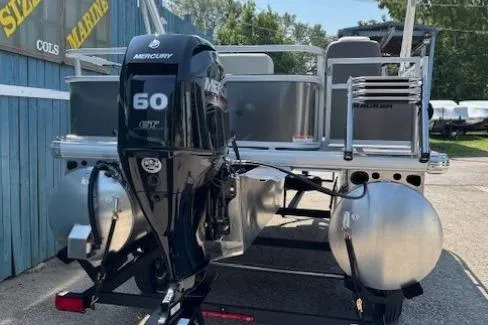 Slide: The Image of 2026 Sun Tracker Bass Buggy 18 DLX pontoon boat with Mercury 60 HP outboard motor. - 3
