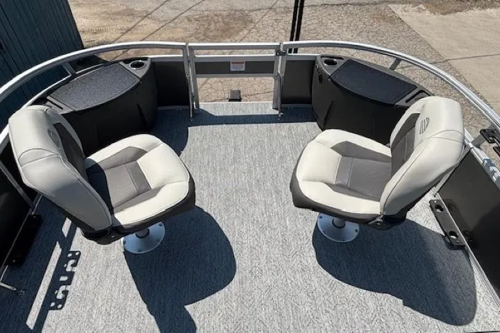 Slide: The Image of 2026 Sun Tracker Bass Buggy 18 DLX pontoon boat interior with two swivel seats. - 7