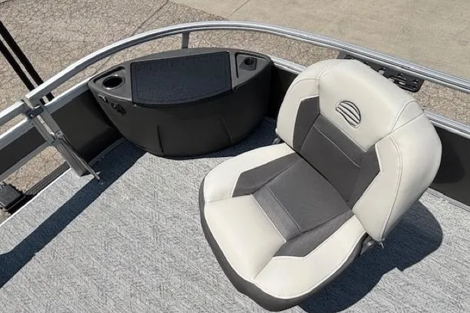Slide: The Image of 2026 Sun Tracker Bass Buggy 18 DLX boat seat with console and cup holder. - 8