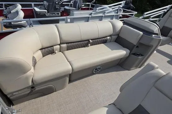 Slide: The Image of 2025 Sun Tracker Sportfish™ 20 DLX boat interior with beige seating and modern design. - 13