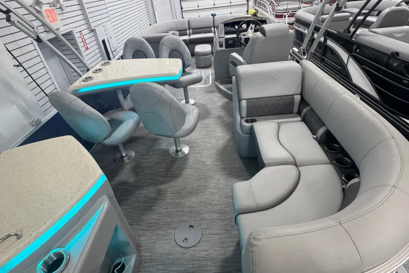 Slide: The Image of 2020 Bennington 23 SXPD boat interior with luxurious seating and modern design. - 14