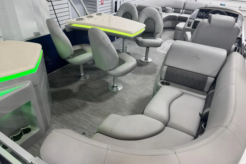Slide: The Image of 2020 Bennington 23 SXPD pontoon boat interior with luxurious seating and modern design. - 15