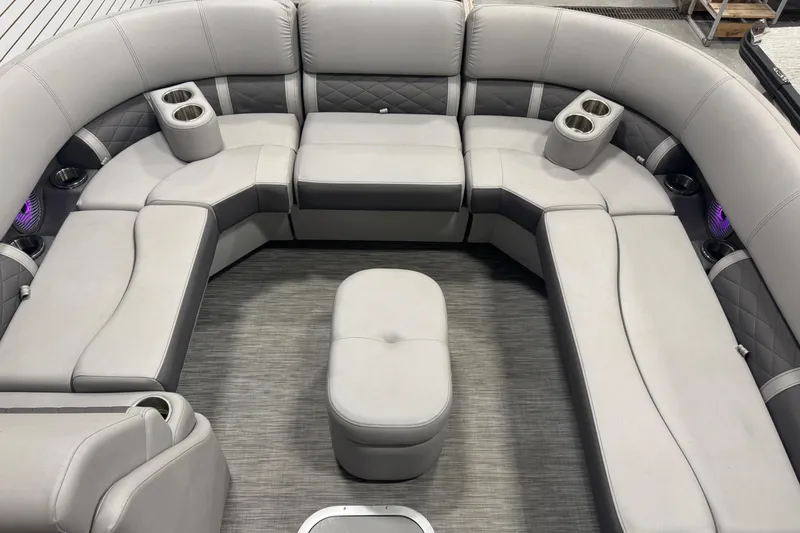 Slide: The Image of Luxurious seating on 2020 Bennington 23 SXPD pontoon boat with cup holders and plush upholstery. - 18