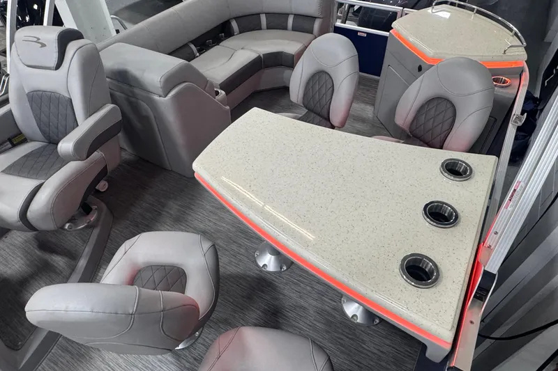 Slide: The Image of Luxurious interior of 2020 Bennington 23 SXPD pontoon boat with plush seating and modern design. - 19