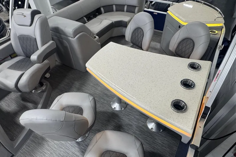 Slide: The Image of Interior of 2020 Bennington 23 SXPD boat with modern seating and table design. - 20
