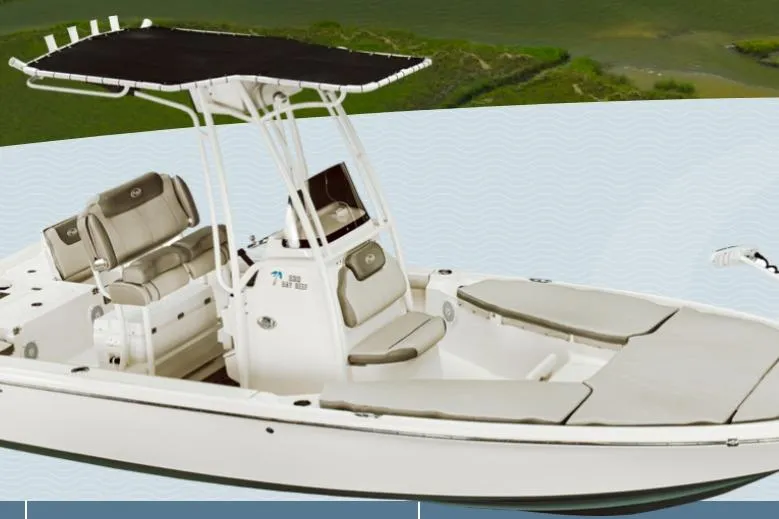 Slide: The Image of 2026 Key West 230 Bay Reef boat with T-top and cushioned seating. - 1