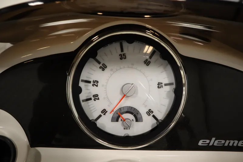 Slide: The Image of Dashboard gauge of 2026 Bayliner Element E18 boat, displaying speed and voltage. - 17