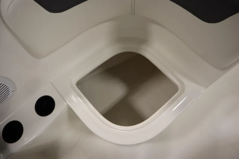 Slide: The Image of 2026 Bayliner Element E18 boat interior storage compartment. - 23