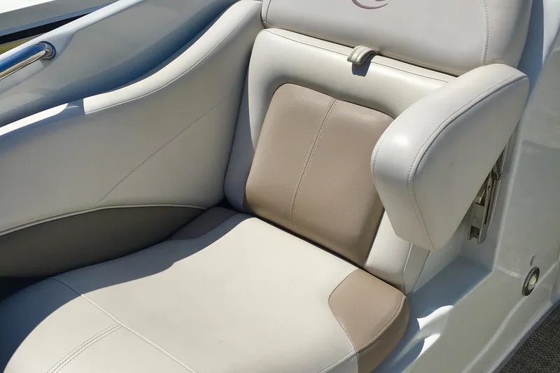 Slide: The Image of 2017 Crownline 275 SS boat seat with beige and white upholstery. - 18