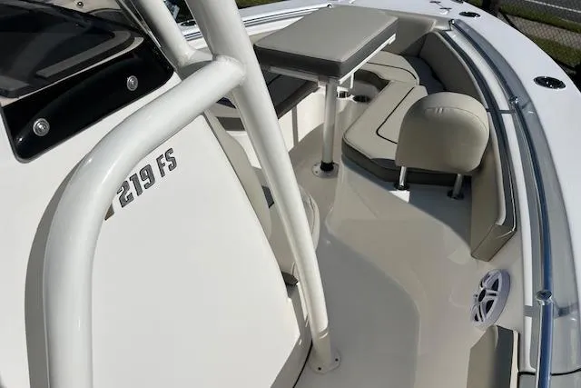 Slide: The Image of 2026 Key West 219 FS boat interior with seating and table. - 9
