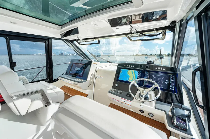 Slide: The Image of Interior of 2024 Boston Whaler 405 Conquest boat with advanced navigation systems. - 27
