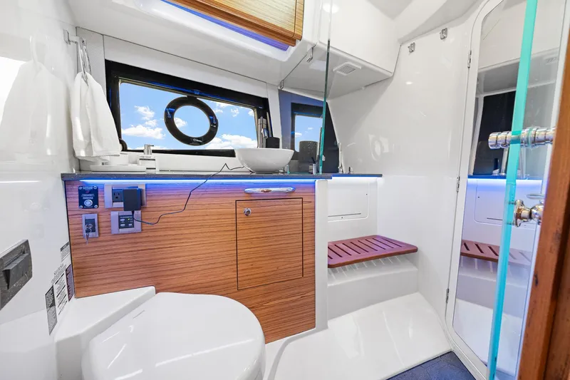 Slide: The Image of Luxurious bathroom interior of 2024 Boston Whaler 405 Conquest yacht with modern amenities. - 50