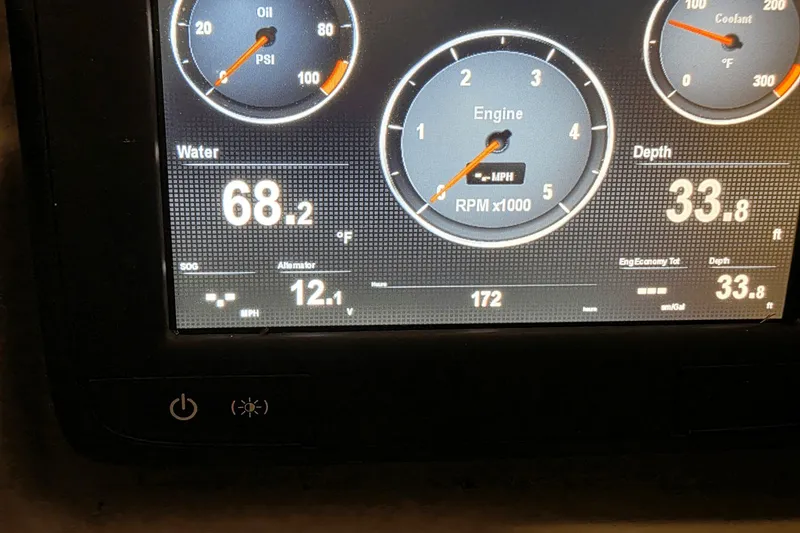 Slide: The Image of Dashboard of 2021 Crownline E 205 XS showing engine metrics and water temperature. - 19