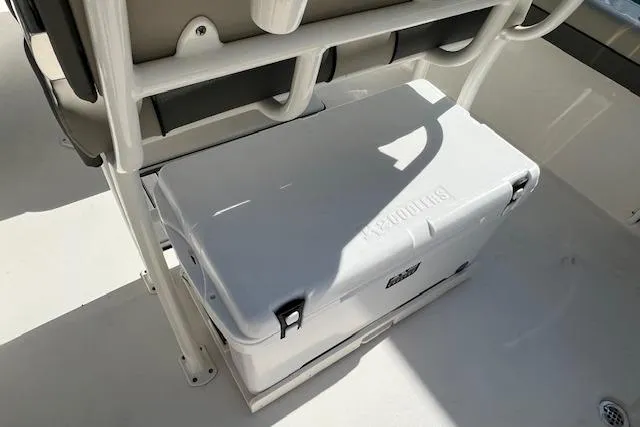 Slide: The Image of 2026 Key West 219 FS boat interior with cooler storage under seat. - 4