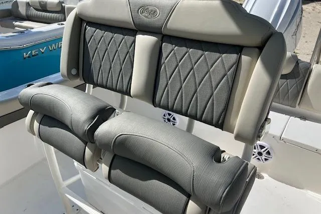 Slide: The Image of 2026 Key West 219 FS boat seats with gray upholstery and diamond stitching. - 5