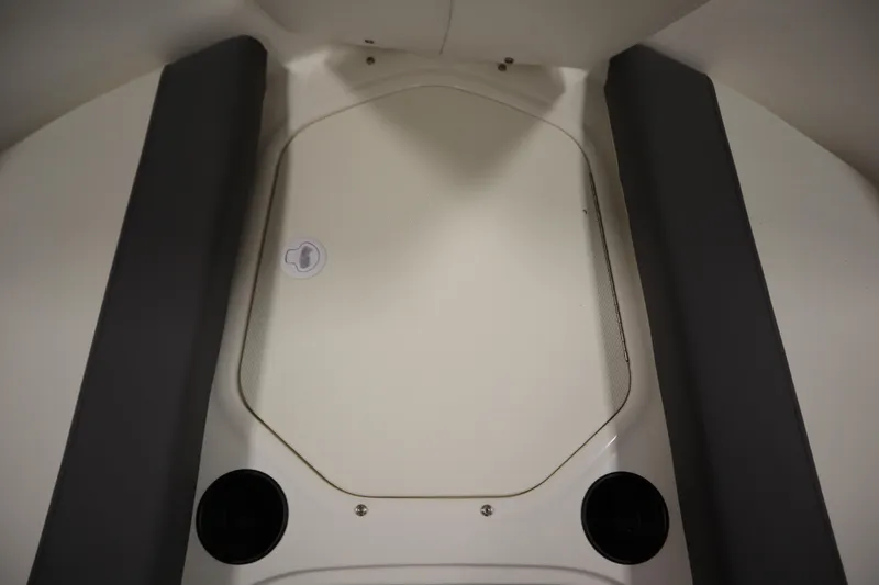 Slide: The Image of 2026 Bayliner Element E18 boat interior with sleek seating and storage area. - 11