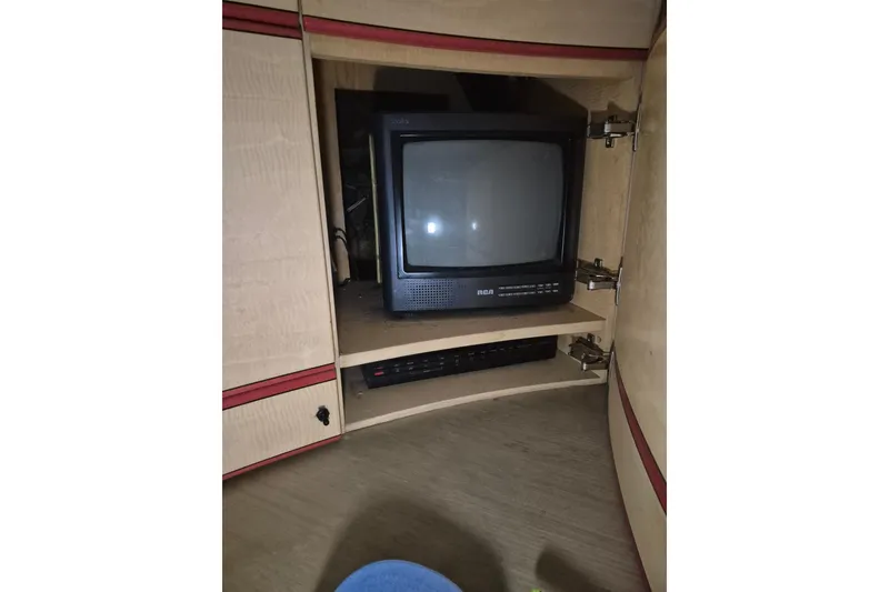 Slide: The Image of Vintage RCA TV in wooden cabinet, Magnum 40 model, 1982. - 35