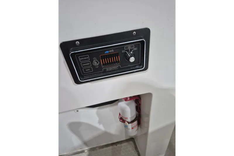 Slide: The Image of Control panel of a 1982 Magnum 40 with safety indicators and settings. - 39